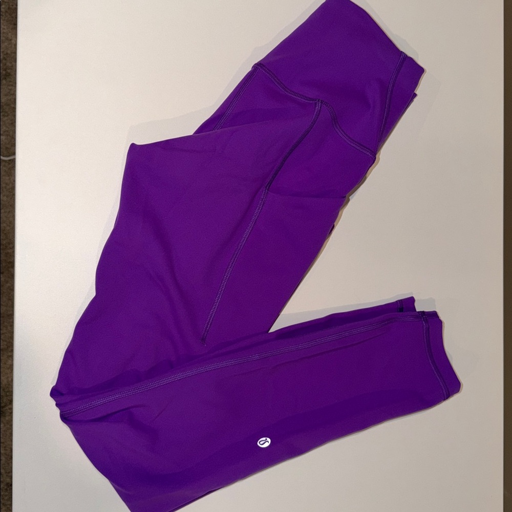 Lululemon -Wunder Train High Rise with Pockets 25", size 4